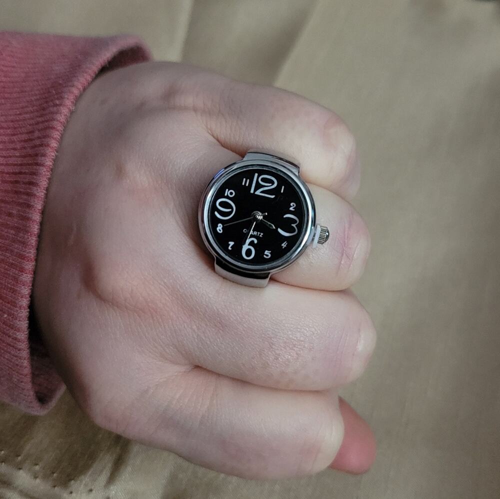 Black and silver watch ring